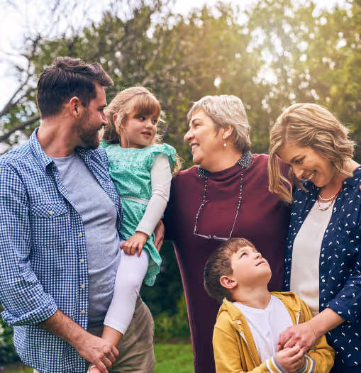 multi-generation family in garden