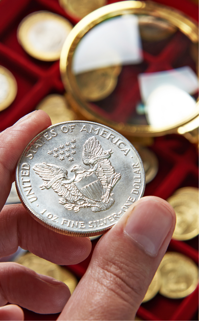 Hand holding coin